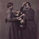 'Pedlar and manservant trying comb'